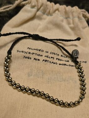 Adjustable Silver Beaded Bracelet with Black Cord